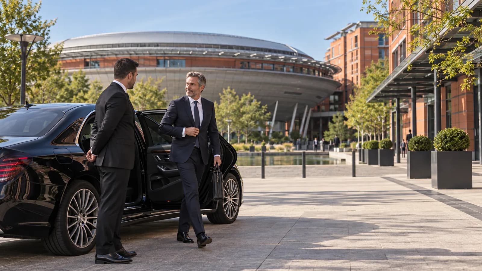 Chauffeur privé Kdrive devant le Centre de Congrès de Lyon